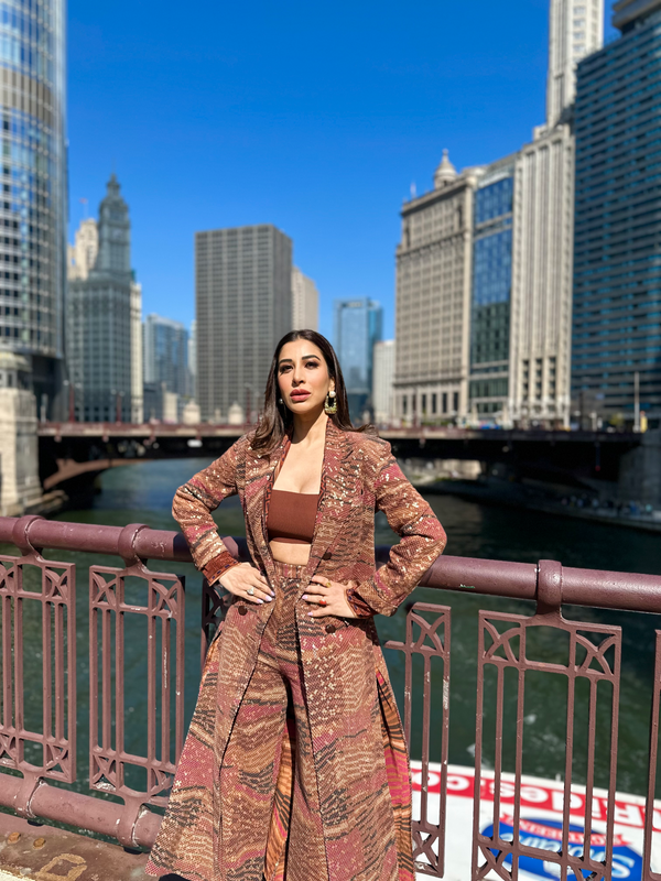 SOPHIE CHOUDRY IN TANGERINE BYZANTINE PRINT TRENCH COAT AND PANTS