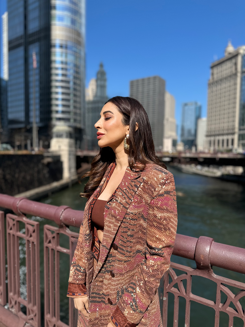 SOPHIE CHOUDRY IN TANGERINE BYZANTINE PRINT TRENCH COAT AND PANTS