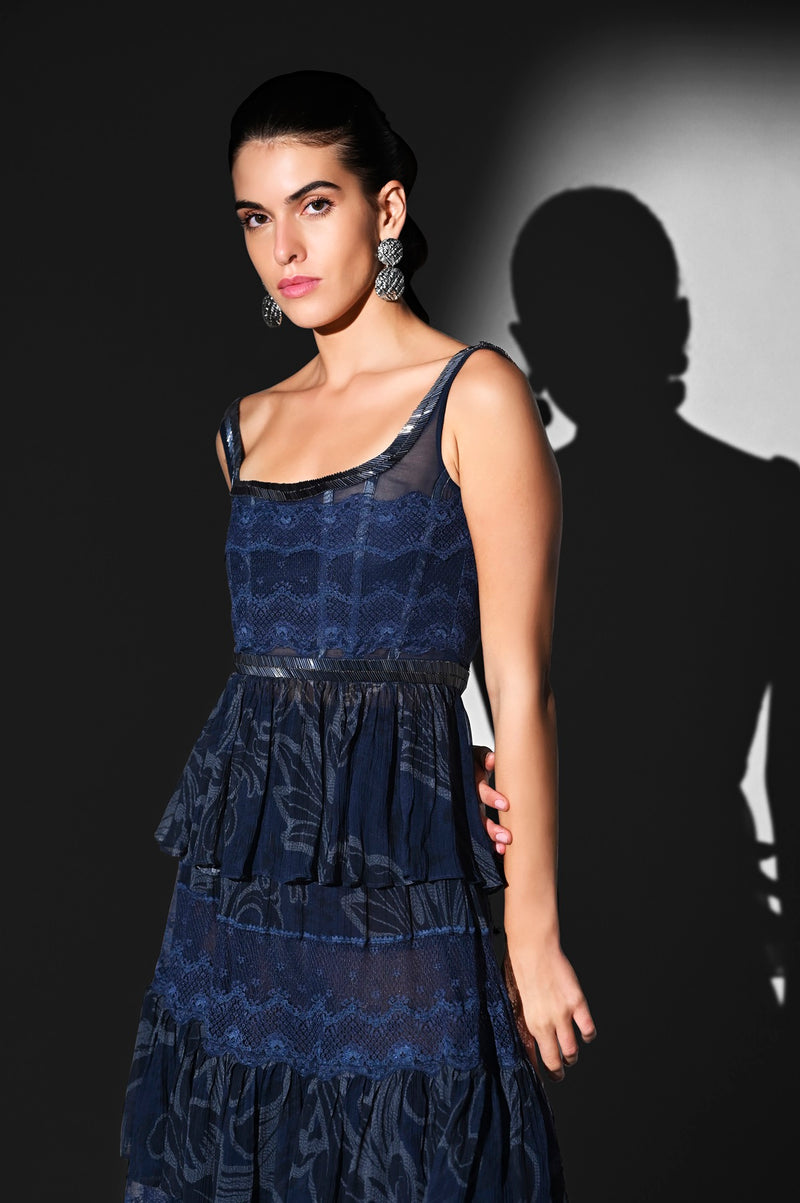 INDIGO SWIRL PRINT PEPLUM TOP WITH GLASS CUT PIPE AND TIER SKIRT