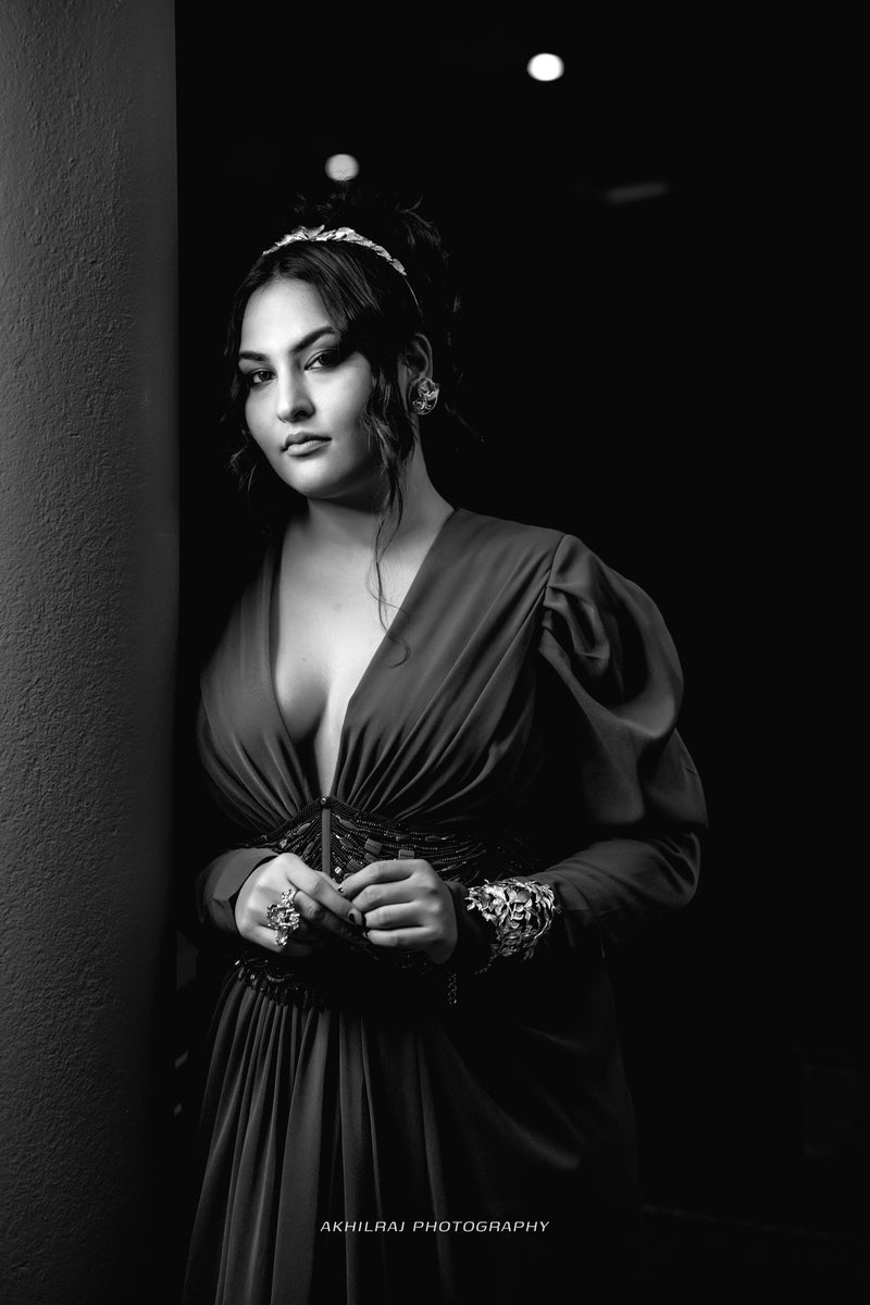 Sakshi Sindhwani In Dark Tan Dress With Slit & Corset
