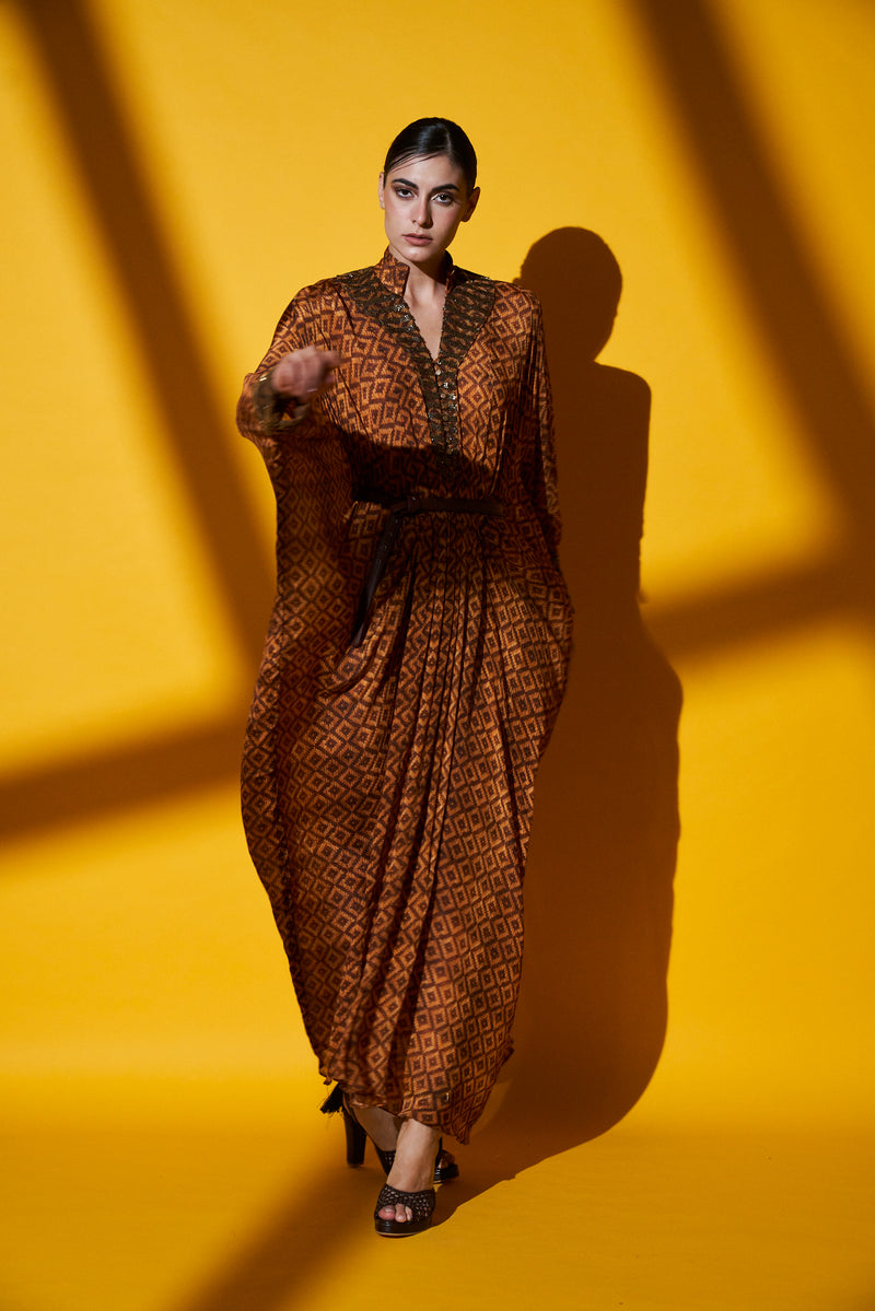 Archana Puran Singh In Beige-Brown Basket Weave Print Pleated Maxi Dress With Embroidered Belt